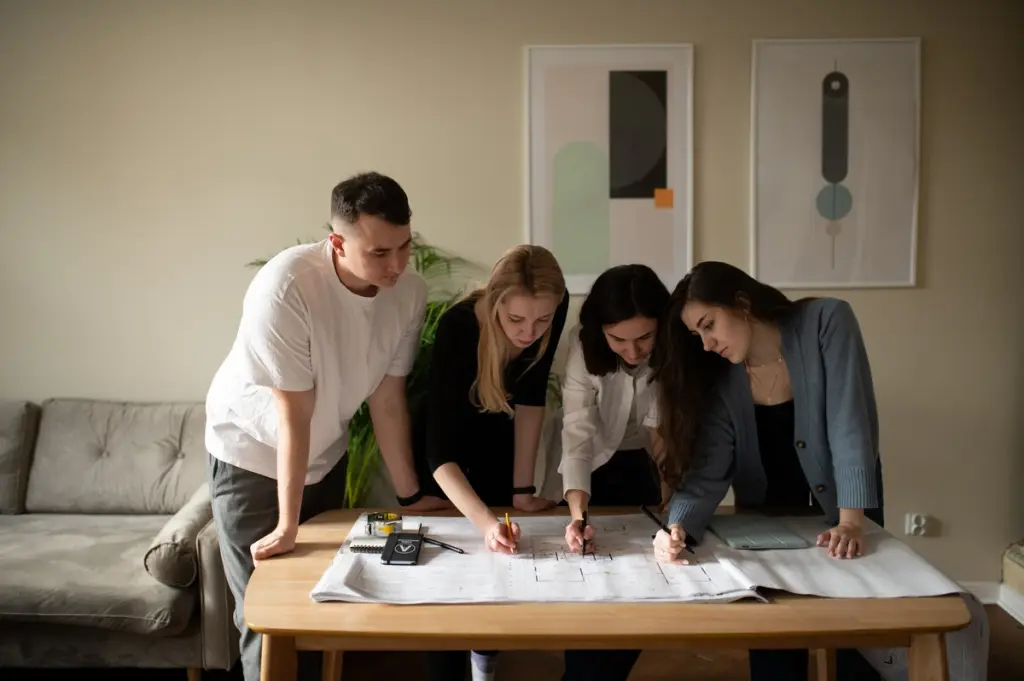 Ataman Studio ADU builder team planning project with clients
